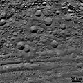 Vestan craters in various states of degradation, with troughs at bottom(6 August 2011)