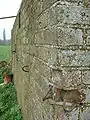 Hooks for camouflage netting on a pillbox at Hancocks Farm, Crookham Village, Hampshire