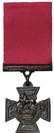 a colour photograph of a medal suspended from a riband