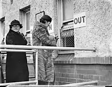 Collecting winnings, Victoria Park racecourse