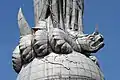 A close-up of the dragon at the feet of the Virgin of El Panecillo (it follows conventional depictions of the Woman of the Apocalypse).