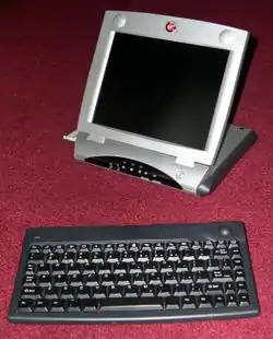 Virgin Webplayer and infrared keyboard with added CompactFlash adapter at left