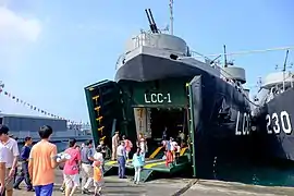 Visitors in front of ROCN Kao Hsiung (LCC-1)