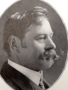 Profile of Victorian man with wide handlebar moustache