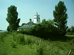 The lighthouse on the West bank of the river mouth