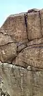 Petroglyphs in Wadi Shie, including horseback and camelback riders.