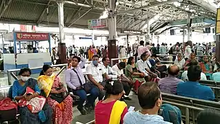 Waiting Travelers at Howrah Railway Station