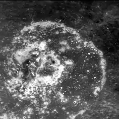 Closeup of Warhol at high sun angle showing the abundant hollows on the crater floor (MESSENGER NAC)