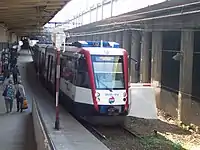 Warszawa Śródmieście WKD station with type EN95 train