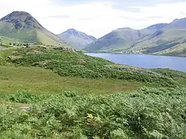 A lake surrounded by mountains