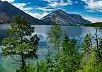 A mountain lake, surrounded by trees