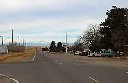 Watkins, looking west along Colfax Avenue.