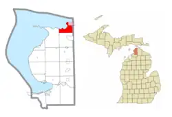 Location within Emmet County (red) and an administered portion of the village of Mackinaw City (pink)