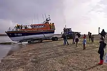 Launching  from a carriage and Talus MB-H amphibious tractor