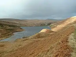 An upland lake surrounded by high moorland