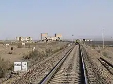 Westernmost point of the Northern Xinjiang railway, with marker showing 2,360 km (1,470 mi) from Lanzhou