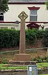 A sandstone cross with a Celtic-type head