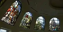 Four highly-detailed stained glass windows.