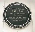 The plaque reads: "William Terriss: 1847–1897. Hero of the Adelphi Melodramas. Met his untimely end outside this theatre 16 Dec 1897.