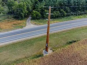 Wood beam transmission tower