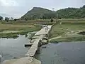 The wooden bridge at nullah Badrai at village Kaddi.