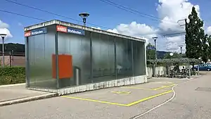 Enclosed shelter on platform