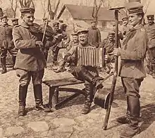 311.22.  Germany, 1917.  Teufelsgeige, bowed with notched stick but also had element of percussion, metal plates on top