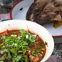 The Thai dish Yam tin khwai is a spicy and sour Northern Thai soup made with the hoof of a water buffalo