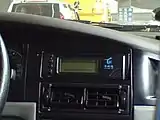 Yang Cheng Tong reader in taxi