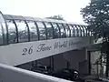 A bridge leading to the front of the stadium over Metro-North Railroad tracks