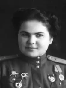 WWII Photo portrait of Ryabova (pre-1945) showing her wearing an Order of the Red Banner, an Order of the Red Star, an Order of the Patriotic War, and a Guards pin