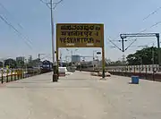 View of nameplate of Yeswanthpur railway station at platform 5