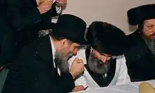 Zvhil-Mezbuz Rebbe of Boston, Grand Rabbi Y. A. Korff (center), and Rabbi Yitzhak (Isadore) Twersky, Tolna Rebbe of Boston (left)