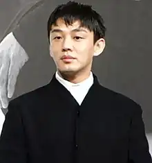 Yoo at the press conference for Do-ol Ah-in Going All Directions in 2019