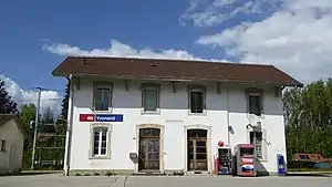 Two-story building with gabled roof