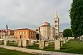 Church of St. Donatus and Archbishops palace (orange building)