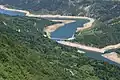 Zavoj lake (meanders of the Visocica river) seen from the Kozji kamen viewpoint.