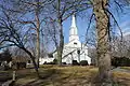 The Zion Episcopal Church building is surrounded by generous grounds that include a cemetery.