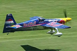 An aircraft flying close to the ground