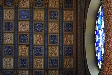 Ceramic ceiling decoration and stained glass of Rumbach Street synagogue