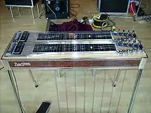  A console pedal steel guitar with two necks