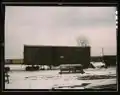 A boxcar being jacked up for repairs on the RIP tracks at Proviso yard, Chicago