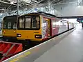 Commuter trains.  A Northern Rail train (British Rail Class 144) in the West Yorkshire Metro livery.  These trains are used for commuter routes around Leeds.