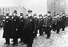 Policemen wearing masks provided by the American Red Cross in Seattle, 1918