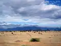 image of hills with dark skyline