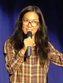 Ali Wong smiling while performing