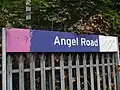 Signage on northbound platform with National Express East Anglia logo on right.