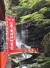 Monk at Shippōryū-ji Temple supervises an ascetic waterfall exercise.