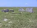 Settlement remains, radio tower in background