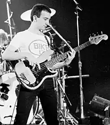 Deacon performing with Queen at the RDS Arena, Dublin in 1979